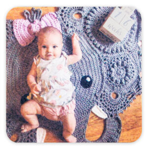 photo of a white photo printed 60pt square coaster, with a photo printed full bleed